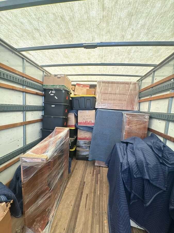 Furniture and boxes loaded inside the truck